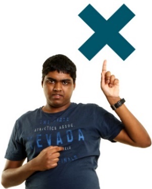 A person pointing to themselves with one hand and pointing to a cross with their other hand.