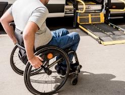 A photo of a person in a wheelchair. 