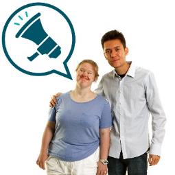 A person with their arm around someone with disability. They have a speech bubble with a megaphone inside it. 